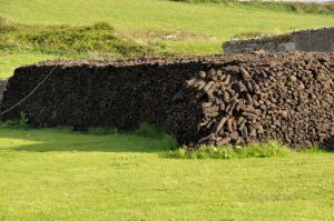 Stacked peat logs in Doolin