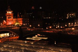 People on a bridge, waiting to join the parade